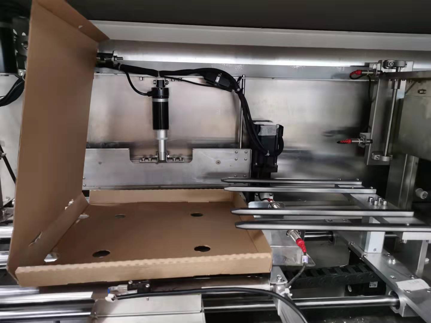 Sleek automated pizza vending machine installed in a modern hotel lobby ready for customers